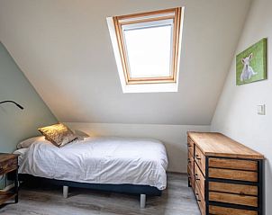 Comfortable bedroom with single bed in Holiday cottage in Den Burg, Texel.