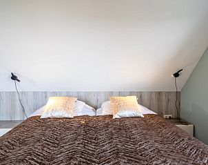 Upstairs corridor in Holiday home in Den Burg, Texel, with access to bedrooms.