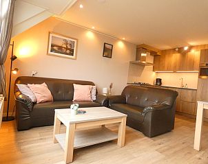 Gezellige woonkamer in NH196 vakantiehuis, Den Burg, Texel.