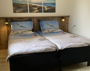 Stylish bathroom in family Smit bungalow Den Burg Texel with modern amenities.