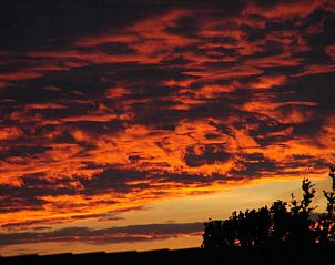Bedroom with double bed in NH010 vacation home, Den Burg, Texel, Wadden Islands