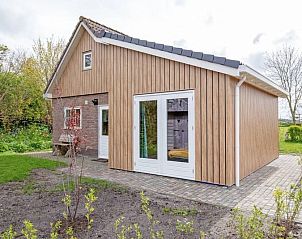 Modern exterior of Holiday home 5 Persoons in Den Burg Texel, ideal for families.