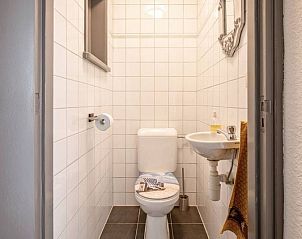 Stylish bathroom in Holiday Home 5 Person Den Burg Texel with practical amenities.