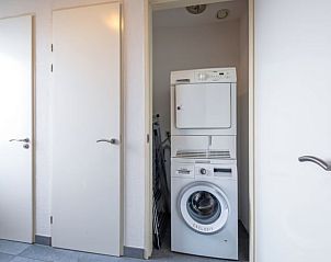 Wasmachine en droger in Vakantiehuisje in Den Burg, Texel, Waddeneilanden.