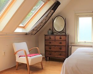 Bright bedroom in The Achterhuys vacation home in Den Burg, Texel.