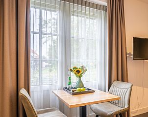 Gezellige zithoek in Villa Nieuw Leven Texel, vakantiehuis in Den Burg, Texel.