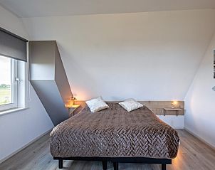Comfortabele slaapkamer in Wulpenweid 12 A Lammetje vakantiehuis De Dennen Texel.
