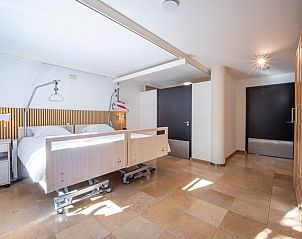 Slaapkamer in Molenhuizen vakantiehuis, Den Burg, Texel, met veel ruimte en lichtinval.