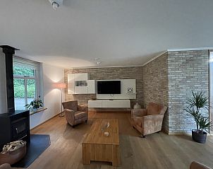 Modern living room in 44 - Aldubo Landhuis, Den Burg, Texel, with stylish furnishings.