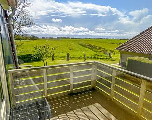 Balkon met panoramisch uitzicht in Vakantiehuis in Den Burg Texel.