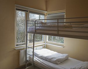 Gemtliches Kinderzimmer mit Etagenbetten im Ferienhaus Tuinwal, Texel.