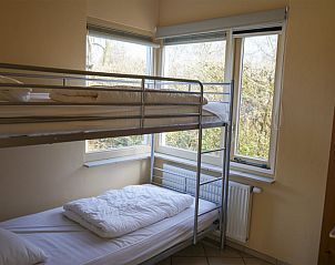 Helles Kinderzimmer mit Aussicht im Ferienhaus Garden Wall, Texel.