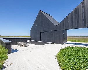 Terrasse des Ferienhauses in Oosterend, Texel mit Blick auf die Texeler Natur.