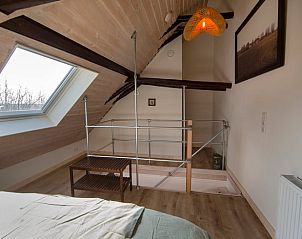 Schlafzimmer mit Dachfenster im Ferienhaus in Oosterend, Texel fr eine erholsame Nacht.