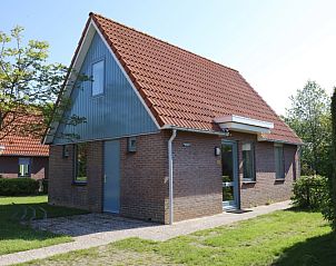 Gezellig vakantiehuis Type I - nr. 55 Marel in Oosterend Texel, omringd door groen, perfect voor een rustige vakantie op de Waddeneilanden.