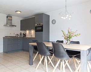 Stijlvolle keuken en eetruimte in Type I - nr. 55 Marel, Oosterend Texel, volledig uitgerust voor gezellige maaltijden op de Waddeneilanden.