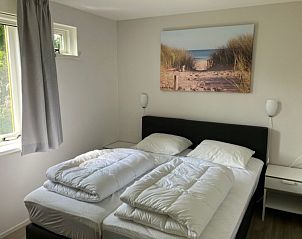 Schlafzimmer mit Doppelbett in Typ I - Nr. 89 Lark Ferienhaus Oosterend Texel.