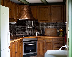 Volledig uitgeruste keuken in Het Rge Landje, vakantiehuis in Dennenbos, Texel, met moderne apparatuur.