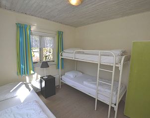 Cozy bedroom with bunk beds in Holiday home De Nagtegaal 15, De Dennen, Texel.