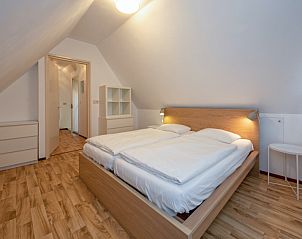 Gemtliches Schlafzimmer im Dachgeschoss von Haus 7 in De Dennen, Texel.