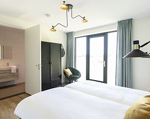 Slaapkamer met badkamer in Rovershut - Familiehuis 2, vakantiehuis in De Dennen, Texel.