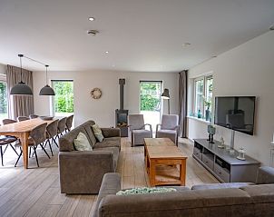 Cozy living room in Holiday home de Parel 152, De Dennen, Texel, with modern furnishings.