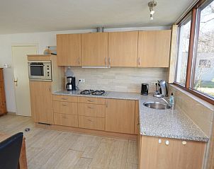 Fully equipped kitchen in Holiday home de Parel 198, De Dennen, Texel overlooking nature.