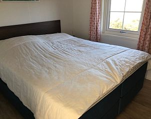 Spacious bedroom with double bed in Holiday Park de Bremakker, Akkerveld 15, De Dennen Texel.