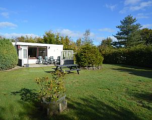 Vacation home de Parel 222 in De Dennen, Texel with spacious garden and terrace.