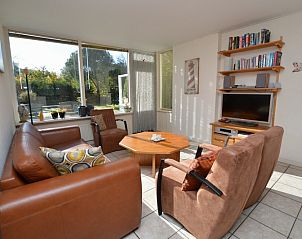 Cozy living room of Holiday home de Parel 222 in De Dennen, Texel.