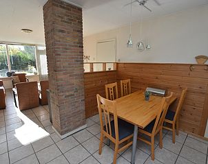 Vacation home de Parel 222 in De Dennen, Texel with cozy dining area.