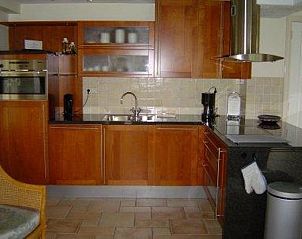 Modern kitchen in Holiday home Gortersmient 356, De Dennen, Texel. Fully equipped for a comfortable stay on the Wadden Islands.