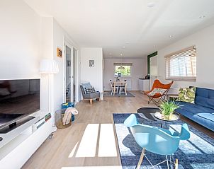 Spacious interior of Bungalowpark Uterste Coogh - Bungalow 128 - Gerrit, vacation home in De Dennen, Texel.