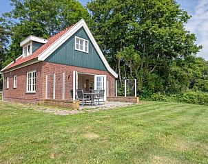 Vrijstaand vakantiehuis 't Mienthuis - De Jonker in De Dennen, Texel, omringd door natuur, perfect voor een rustgevende vakantie op de Waddeneilanden.