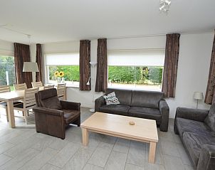 Ess- und Sitzecke im Tempelierweg 36 - Ogamu, Ferienhaus in De Dennen, Texel mit Gartenblick.