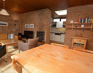 Open kitchen and living room in Holiday home de Parel 204, De Dennen, Texel with modern furnishings.