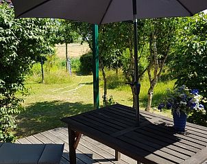 Vakantiepark De Bremakker - Ta Lme - Akkerveld 30, zonnig terras met parasol in De Dennen, Texel, Waddeneilanden.