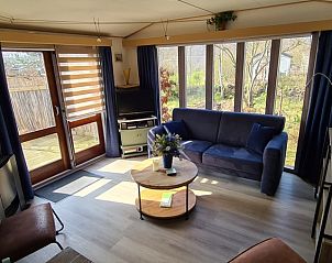 Vakantiepark De Bremakker - Ta Lme - Akkerveld 30, comfortabele zithoek in vakantiehuis in De Dennen, Texel, Waddeneilanden.