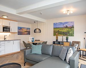 Open kitchen and dining area in Apartment Bos en Duin 28, De Dennen, Texel, ideal for cozy meals with the family.