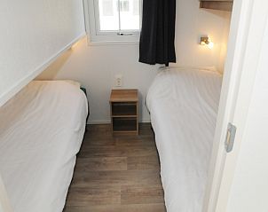 Schlafzimmer mit Doppelbett in Villetta, Ferienhaus fr 6 Personen, De Dennen, Texel.