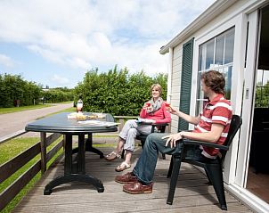 Genieen Sie die Terrasse im Villetta Ferienhaus fr 6 Personen, De Dennen, Texel.