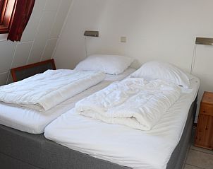 Komfortables Schlafzimmer im Ferienhaus Gortersmient 246, De Dennen, Texel. Erholsamer Raum fr eine gute Nachtruhe.