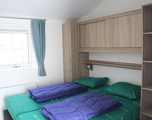 Bedroom with double bed in Villetta disabled, De Dennen, Texel.