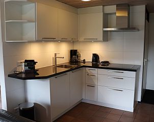 Modern kitchen in Holiday home Gortersmient 324, De Dennen, Texel, fully equipped for culinary adventures.