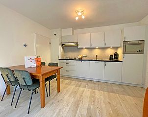 Restful bedroom in Apartment Bos en Duin 08, De Dennen, Texel, overlooking nature.