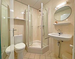 Exterior of Apartment Bos en Duin 08, De Dennen, Texel, surrounded by green nature and tranquility.