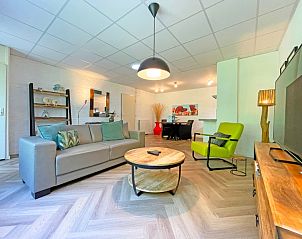 Spacious interior of Apartment Bos en Duin 06, De Dennen, Texel with stylish furniture and bright ambiance.