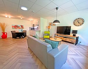 Open kitchen and dining area in Apartment Bos en Duin 06, De Dennen, Texel, ideal for cozy meals.