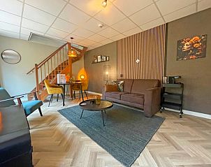 Stilvolle Sitzecke im Appartement Bos en Duin 24, De Dennen, Texel, ideal zum Entspannen nach einem Tag voller Entdeckungen.