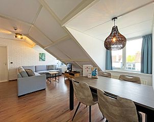 Cozy living room in Apartment Bos en Duin 33, De Dennen, Texel with modern decor and lots of natural light.